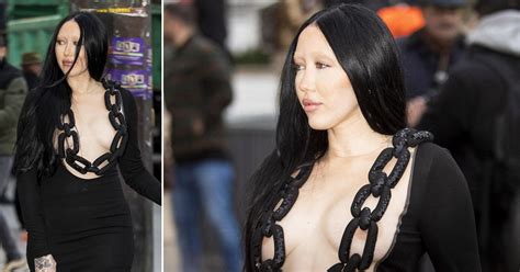 miley cyrus sister noah nearly suffers nip slip in paris as she dons very revealing chain