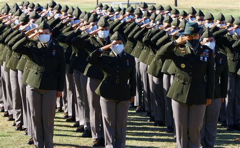 First Basic Training Class Graduates Wearing Army Green Service Uniform