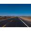 Long Flat Straight Desert Highway – Photographs By Graham J Underwood