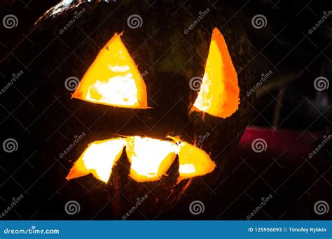 Scary Halloween Pumpkin With Glowing Eyes And Smile Stock Image Image