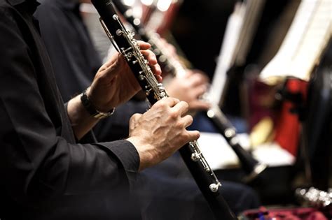 Hands Of Man Playing The Clarinet Stock Photo Download Image Now Istock
