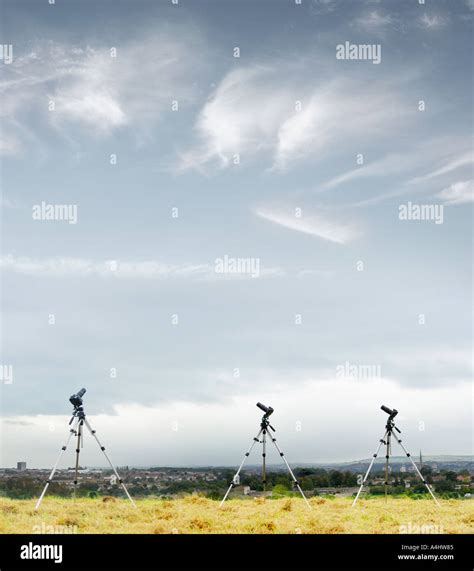 Three Cameras On Three Tripods Stock Photo Alamy