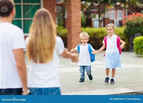 School Pick Up Mother And Kids After School Stock Photo Image Of