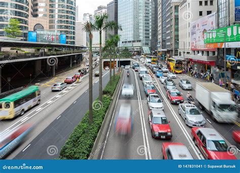 Cars And Pedestrian On Street Scene Of Traffic At Central Hong Kong