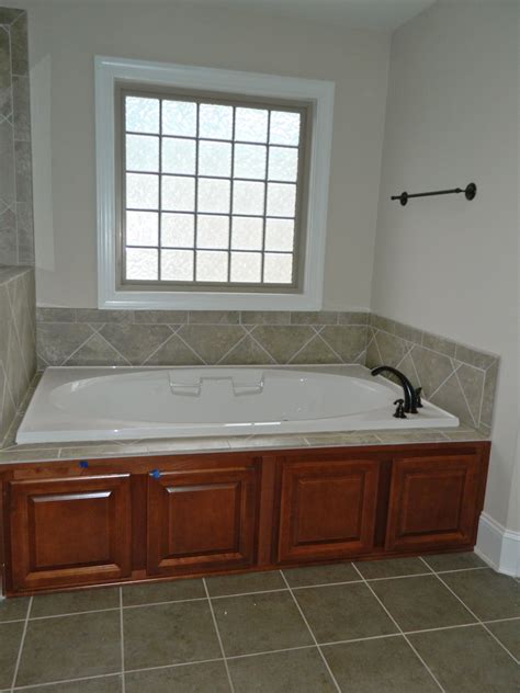 However, the tub is large and the water heater doesn't make enough hot water so by the time the tub is filled above the jets, it's lukewarm. 6' Drop-In Tub with Timberlake Scottsdale Maple Cognac ...