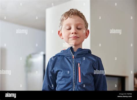 Boy Closing His Eyes Stock Photo Alamy