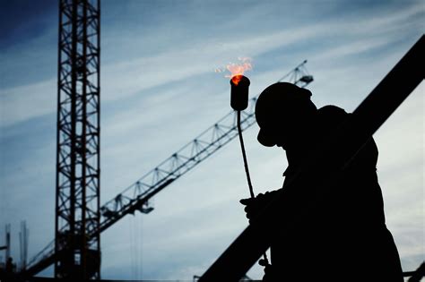2 Man On Construction Site During Daytime · Free Stock Photo