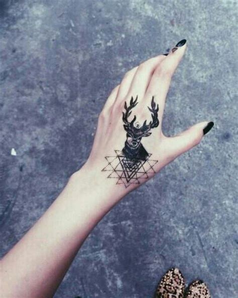 60 Eye Catching Tattoos On Hand Hand Tattoos Tattoos