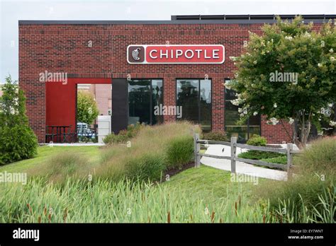 A Logo Sign Outside Of A Chipotle Mexican Grill Fast Casual Restaurant