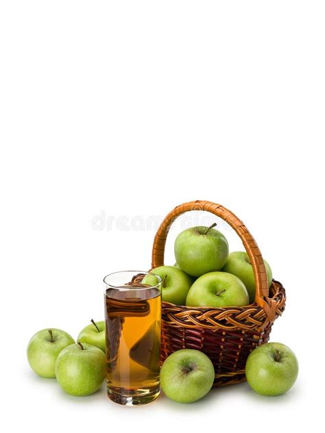 Glass With Apple Juice And Basket With Fruits Of Green Apples Stock