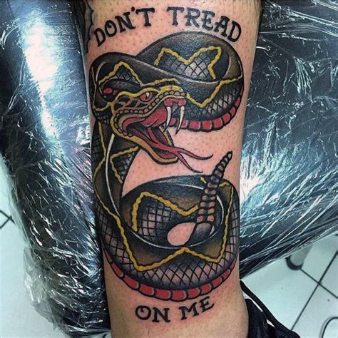 Don't tread on me is an expression that refers to the gadsden flag. Dont Tread On Me Snake Tattoo