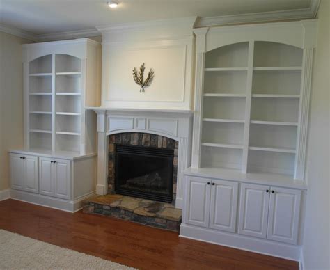 A long, narrow lounge room, for example, risks looking. Fireplace Built-ins with divided arched bookcase ...