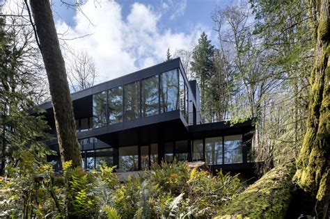 Black Wood And Glass Volumes Stagger Down Woodland In Oregon To Form