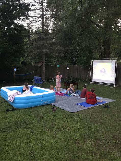 Hula party movie night! Outdoor movie with a pool theme. | Outdoor movie, Outdoor, Outdoor blanket