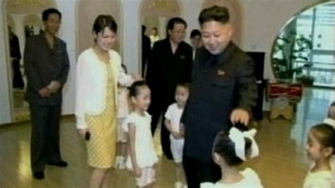 north korean leader kim jong un s wife makes first appearance in a year bbc news