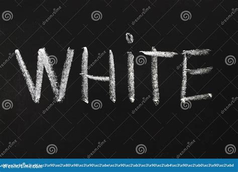 The Word White Written In White Chalk On A Black Chalkboard Stock Photo