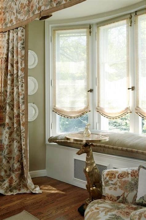 Here is a great resource with several great ways to style window treatments for bay windows. 15+ Bay Windows Curtains | Curtain Ideas