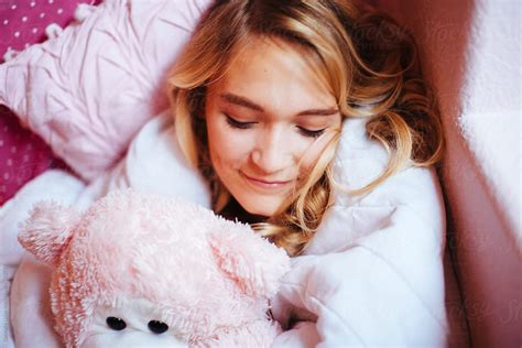 beautiful girl cuddling with bear by stocksy contributor gabrielle lutze stocksy
