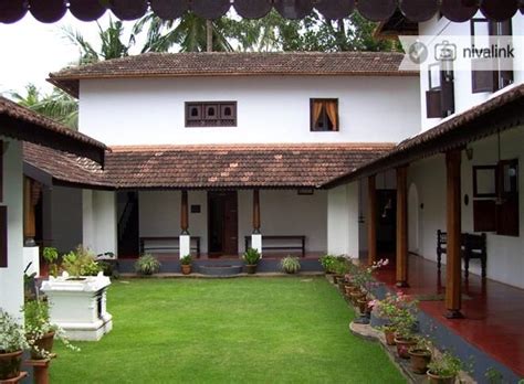 The front porch has become an important part of its design. https://www.google.co.in/search?q=jaipur vase | Village house design, Courtyard house plans ...