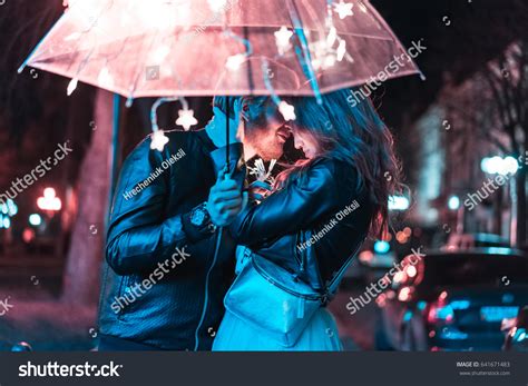 Guy Girl Kissing Under Umbrella On Stock Photo 641671483 Shutterstock