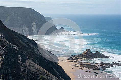 Steep Coast At A Remote Beach With Clear Water Stock Image Image Of