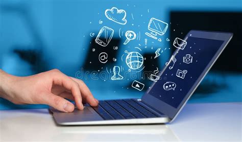 Hand Writing On Notebook Computer With Media Icons Stock Photo Image