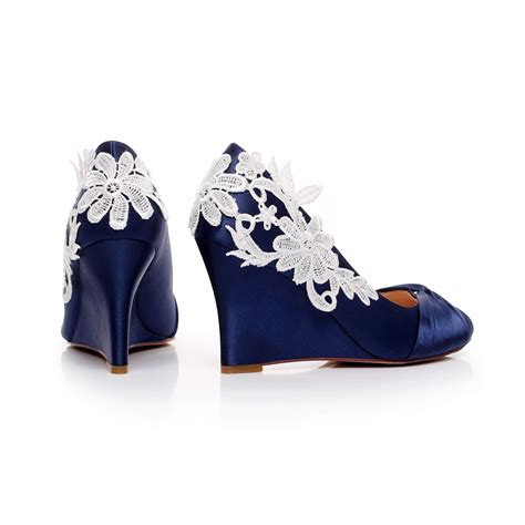 From kitten heels to slides to wedges, these 20 comfortable and cute wedding shoes will have you happy dancing all season long another one for the bridal babes: satin bridal shoes Blue Wedding Shoes Wedge Wedding Shoes ...