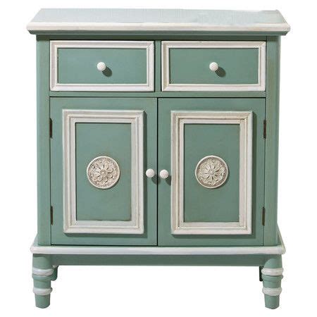 Some of our most popular design options are shown in the pictures below. Antiqued blue cabinet with white trim and medallion ...