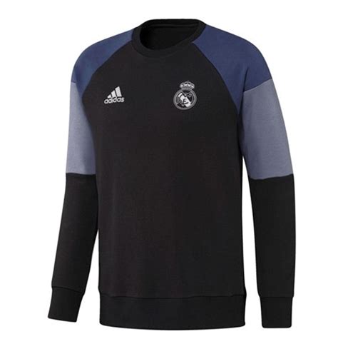 Der trainingsanzug ist cool und stylish zugleich und passt sowohl zum spieltag als auch in die freizeit. Kaufe Sweatshirt Real Madrid 2016-2017 (Schwarz)