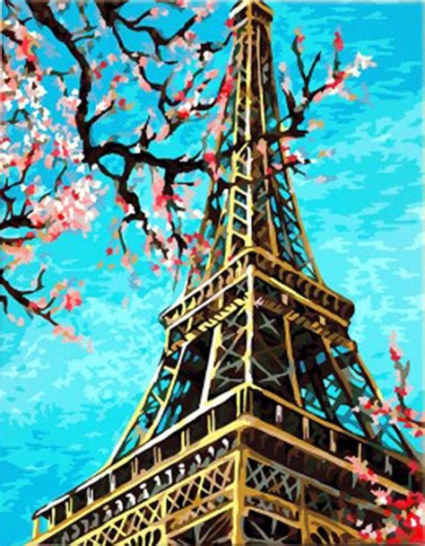 The Eiffel Tower Is Surrounded By Cherry Blossoms