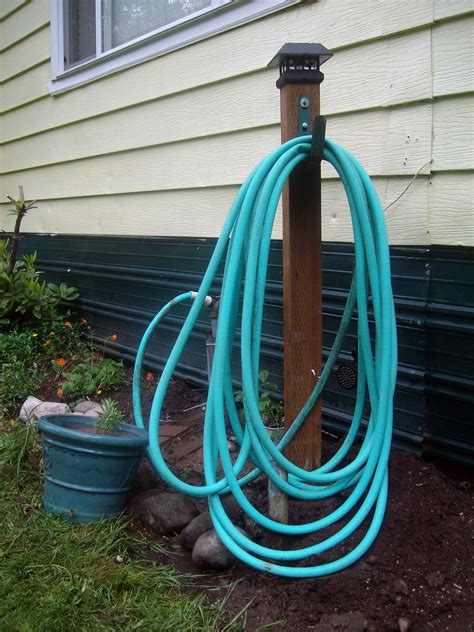 Tools and materials i propose: D.I.Y-Hose Rack Hanger: Bought Cedar Treated 8 ft. Fence ...