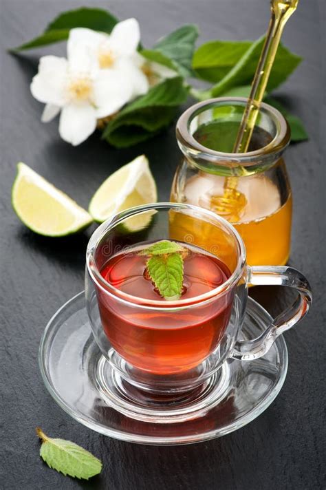 Herbal Tea With Mint Jasmine Flowers And Honey Concept Of Health