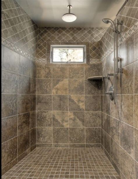 The variety of tile that make up this shower is impressive and interesting. The walk in showers adds to the beauty of the bathroom and ...