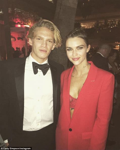 ruby rose poses with cody simpson at gq men of the year awards daily mail online