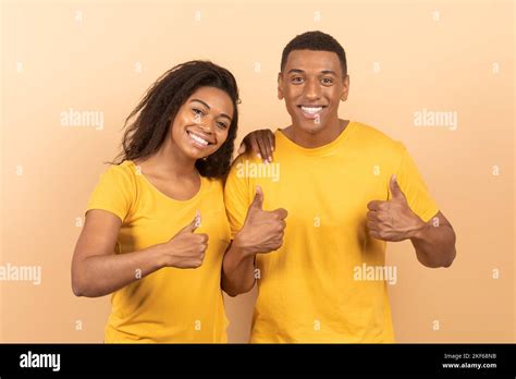 Best Choice We Like It Happy Black Couple Showing Thumbs Up Gesture