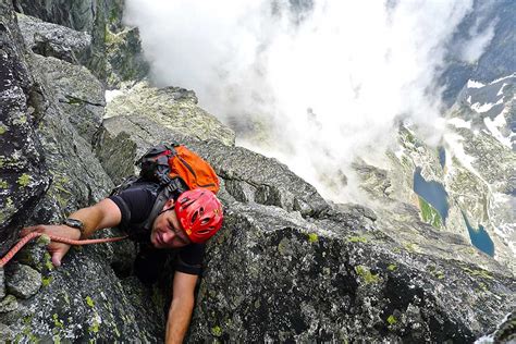 Bp3 En Krkpd Zacopane Freerajdy Rock Climbing Shot Of Man Climbing Steep Mountain Cliff1 Park