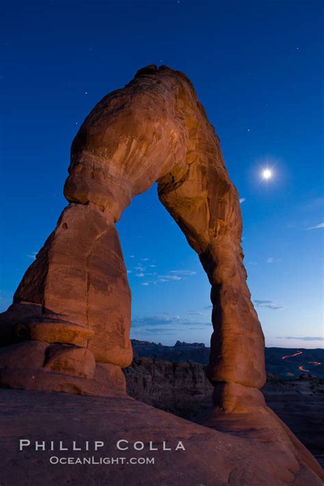 Delicate Arch And The Moon At Sunset Arches National Park Utah