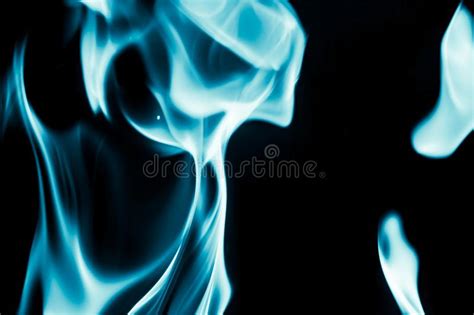 Abstract Background Of Blue Flame Fire On Black Background Stock Photo