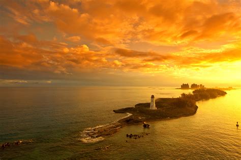 Cloud Lighthouse Ocean Horizon Sunset Wallpaper Coolwallpapersme