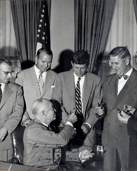 Photograph Of John F Kennedy Receiving Signing Pen From President