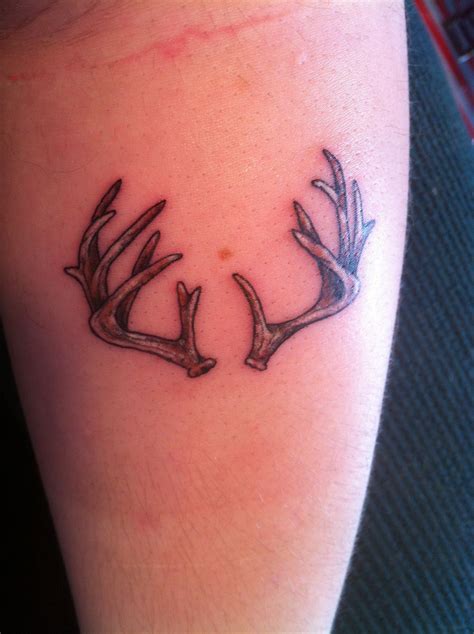 Deer Antlers And Flowers Tattoo