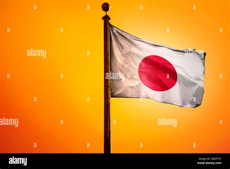 Japan Flag Flag Waving With Sunrise Stock Photo Alamy