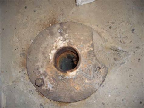 We cannot hide it inside a closet because that would make it a bedroom, requiring an escape window, and we do not want to go that route. Replacing oakum and lead joint in basement bathroom