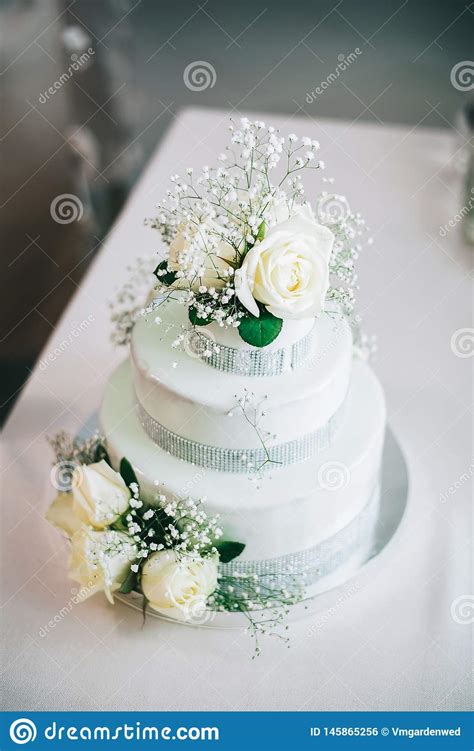Wedding Cake With Flowers Yellow Beige Turquoise Green Stock Photo