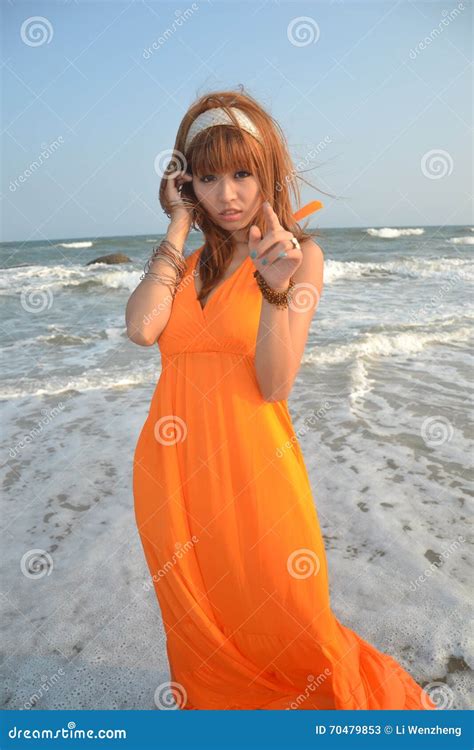 beautiful asian girl at the beach stock image 70479853
