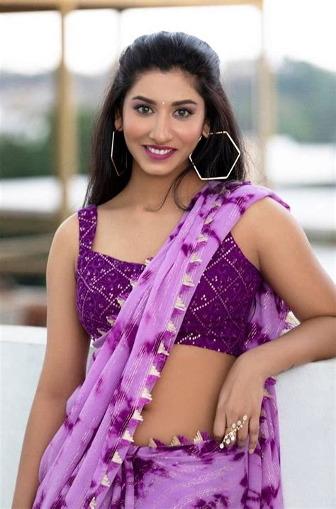 tv anchor vishnu priya hot poses in saree glam actress