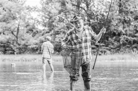 Fisherman With Fishing Rod Activity And Hobby Fishing Freshwater Lake