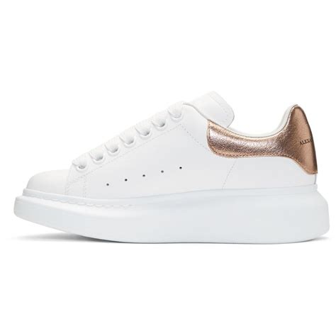 The sneakers come with an additional set of shoelaces. Alexander McQueen Leather White And Rose Gold Oversized ...