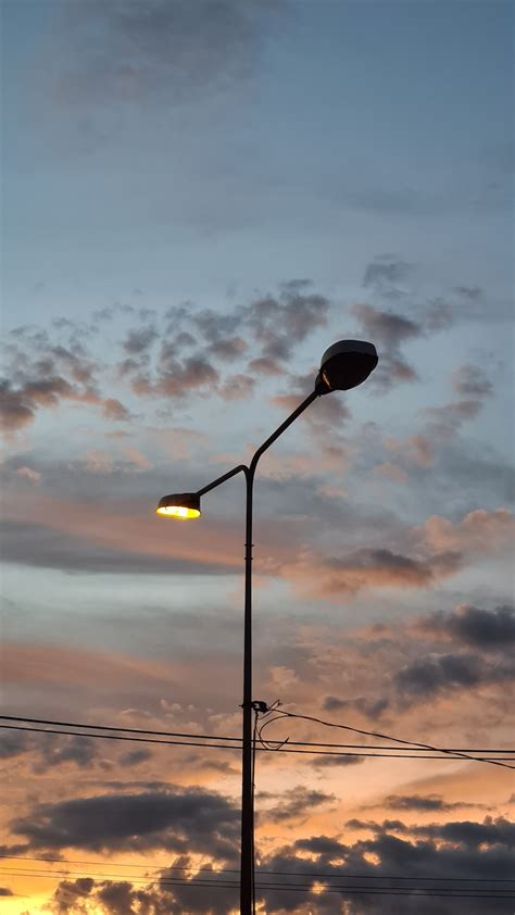 Black Street Light Under Cloudy Sky During Daytime Photo Free Lamp