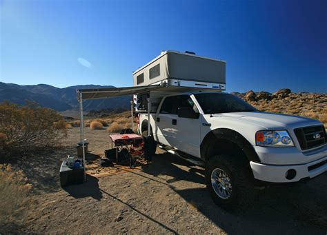 A canopy is a type of door which sits on top of a car and lifts up in some way, to provide access for passengers. RAVEN POP-UP (5.8' SHORTER BED) - Four Wheel Campers | Low ...